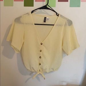 sheer yellow blouse